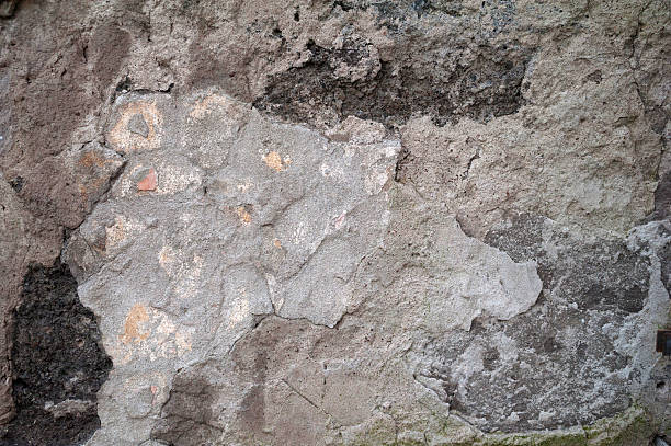 istock Texture of old wall covered with gray stucco 534670775