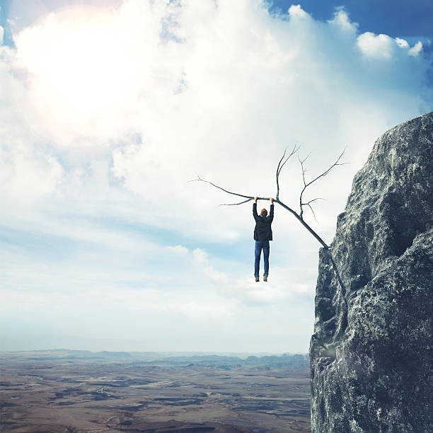 istock Businessman climbs a mountain 534671243
