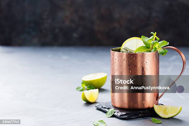 Cold Moscow Mules Cocktail With Ginger Beer Vodka Lime Stock Photo - Download Image Now