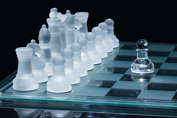 chess pawn against all stock photo