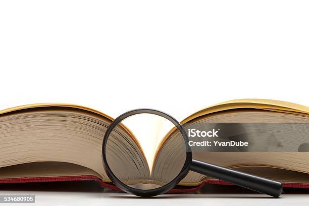 Open Book With Magnifying Glass Stock Photo - Download Image Now - 2015, Arts Culture and Entertainment, Book