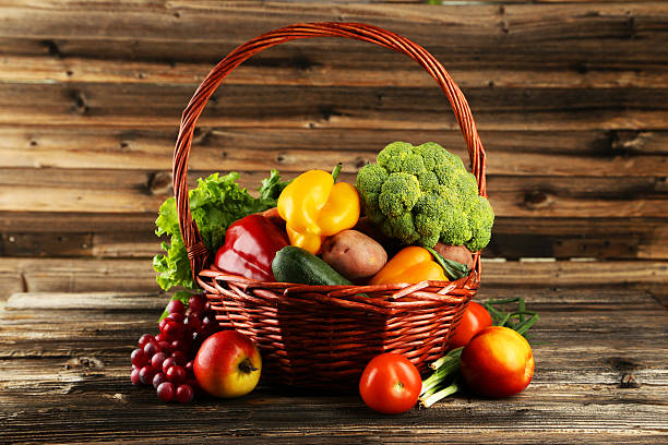 istock Vegetable in basket on brown wooden background 534681427
