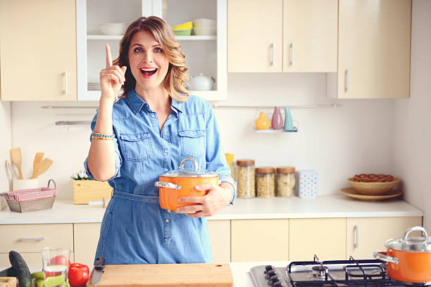istock beautiful blonde woman in the modern kitchen 534681457