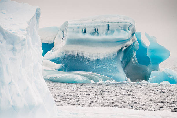 istock Antarctica Deep Blue Old Ice Iceberg Detail 534681519