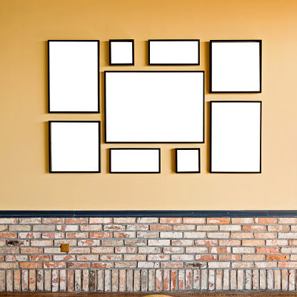 Group of blank frames on the wall