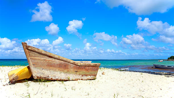 istock Small wooden boat on the beach 534701605
