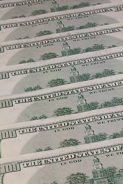 istock Detail of the same pattern dollar bills 534703383