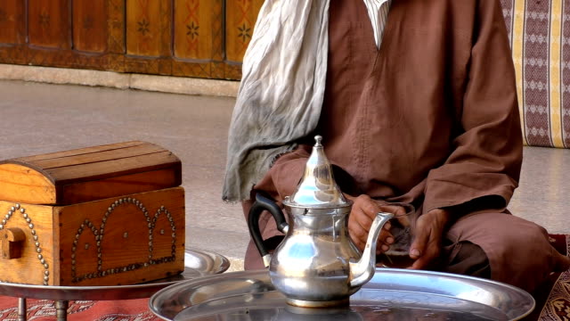 Man drinking his tea at home in Morocco