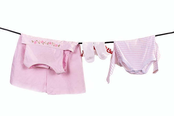 istock Baby clothes hang on clothesline 534705071