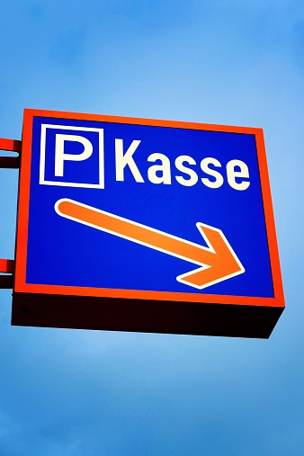 Kasse - cashbox sign blue background outdoors