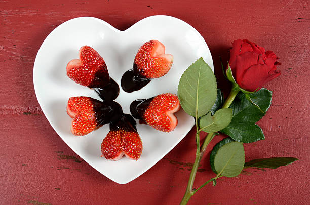 istock Valentines Day chocolate dipped heart shaped strawberries 534717603