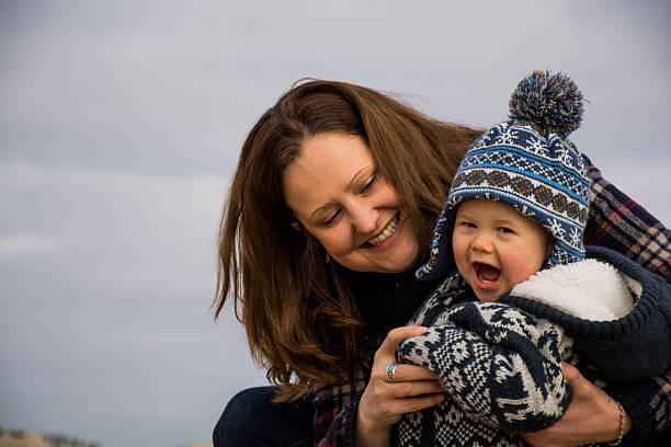istock Mother and son enjoying themselves on the beach 534721593