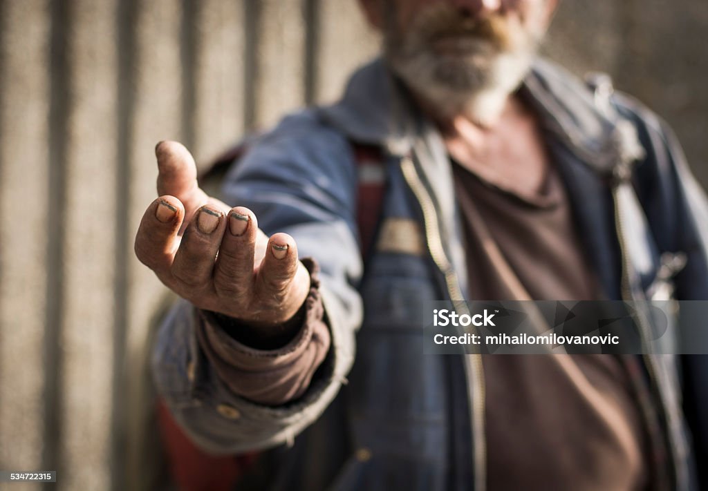 Poverty Senior person begging for food or money. Poverty Stock Photo