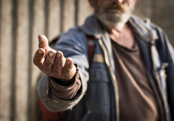 Poverty Senior person begging for food or money. begging currency beggar poverty stock pictures, royalty-free photos & images