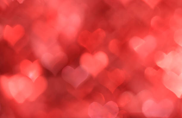 istock Abstract light red valentine background with heart-shaped boke 534722663