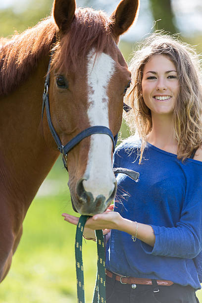 istock girl and horse 534729764