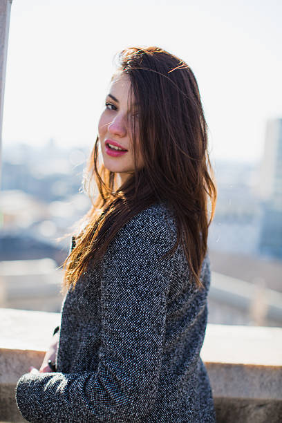 istock Beautiful woman on the roofs of Milan Duomo 534738053