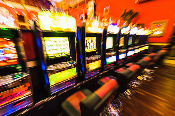 Gambling - defocussed row of casino slot machines