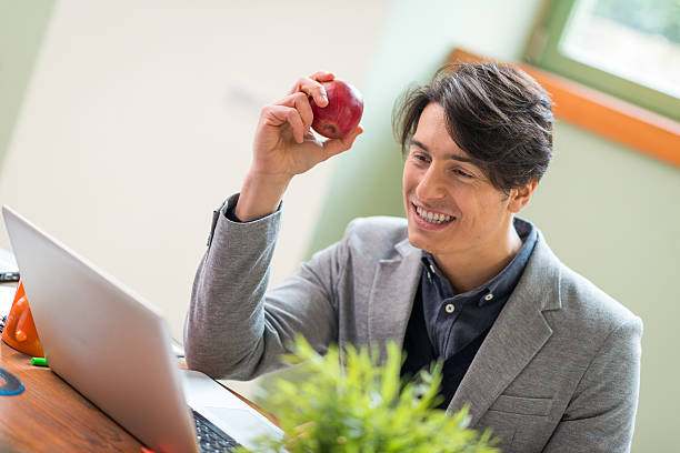 istock Young man working in startup coworking business office 534738129