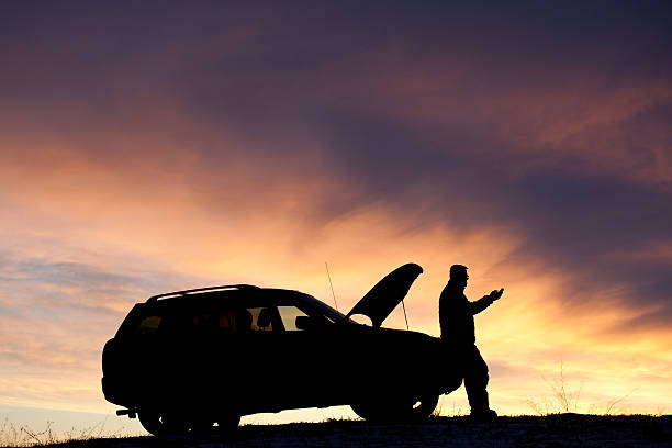 istock Man With Car Trouble Texting For Roadside Assistance 534738141