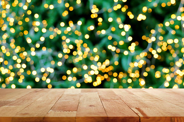 istock Wood table top on bokeh background from christmas tree 534739657