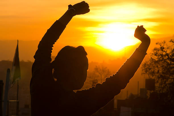 istock Silhouette of woman stretching 534740139