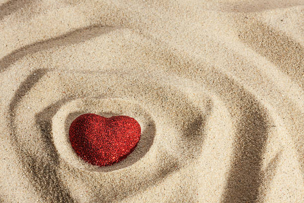istock Symbolic heart in the sand 534745111
