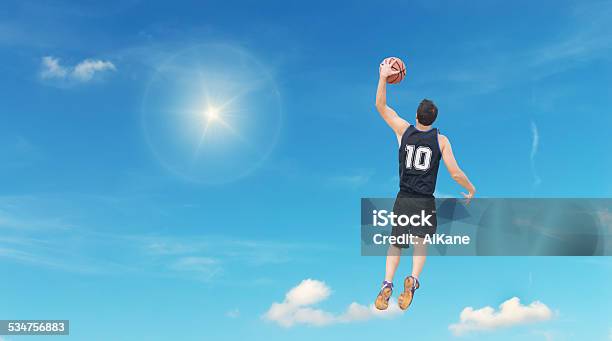 Slam Dunk In The Sky Stock Photo - Download Image Now - 2015, Active Lifestyle, Activity