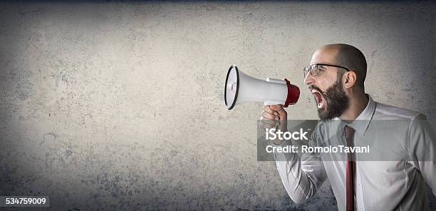 Man Screaming With Megaphone Stock Photo - Download Image Now - Marketing, 2015, Adult