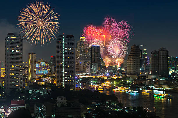 istock Fireworks night scene with bangkok cityscape river view 534759289
