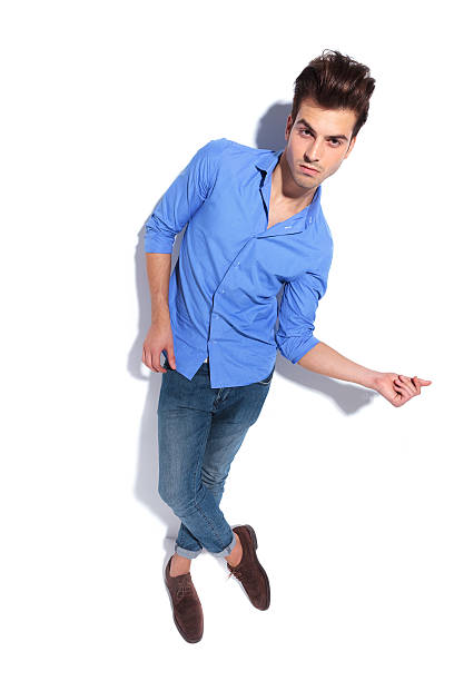 istock young fashion man snapping his fingers. 534759781