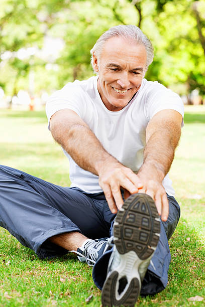 istock Senior Man Stretching in the Park 534760023