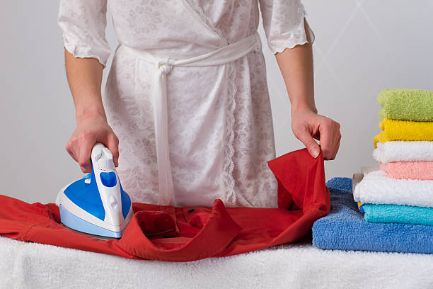 istock housewife in white dressing gown 534760639