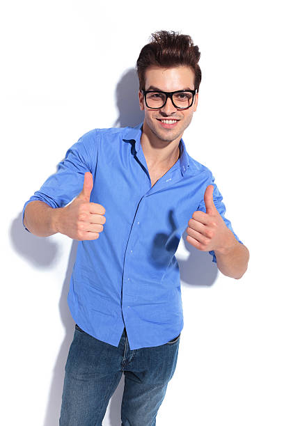 istock business man showing the thumbs up gesture 534760739