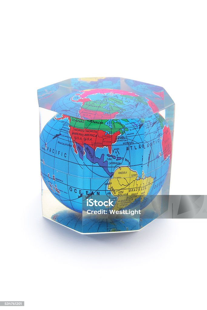 Globe Paperweight Globe Paperweight on Isolated White Background 2015 Stock Photo