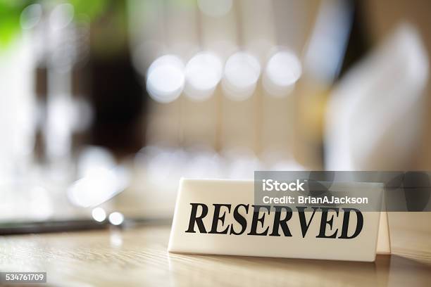 Reserved Sign On Restaurant Table Stock Photo - Download Image Now - Reserved Sign, Native American Reservation, Restaurant