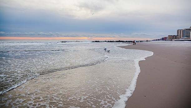 istock Two sisters at Long Beach, Long Island in winter 534763137