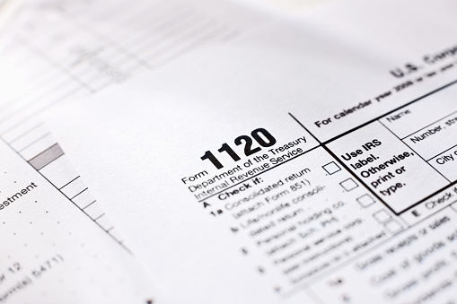 Close-up of 1120 income tax form. Horizontal shot.