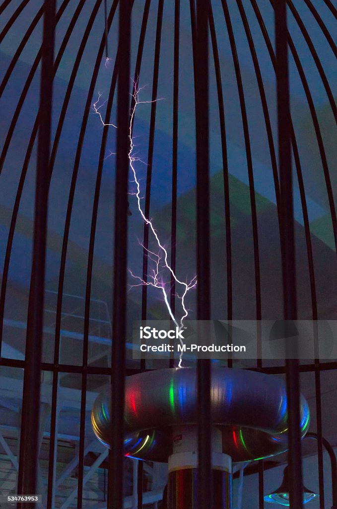 Resonant transformer in work. Tesla coil. Tesla Coil Stock Photo