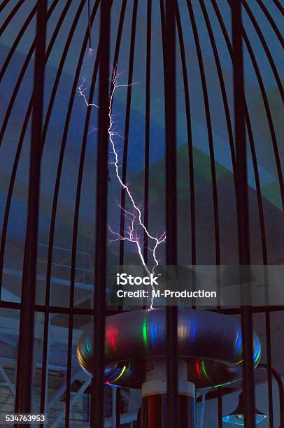 Resonant Transformer In Work Tesla Coil Stock Photo - Download Image Now - Tesla Coil, Electricity, 2015