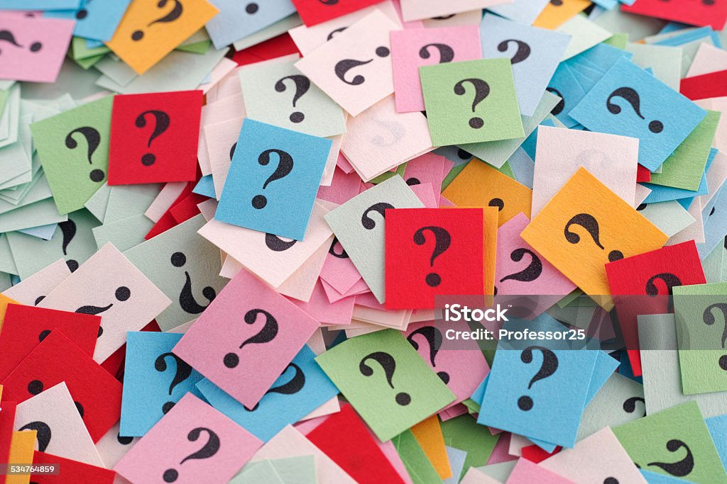 Too Many Questions Pile of colorful paper notes with question marks. Close-up. Question Mark Stock Photo