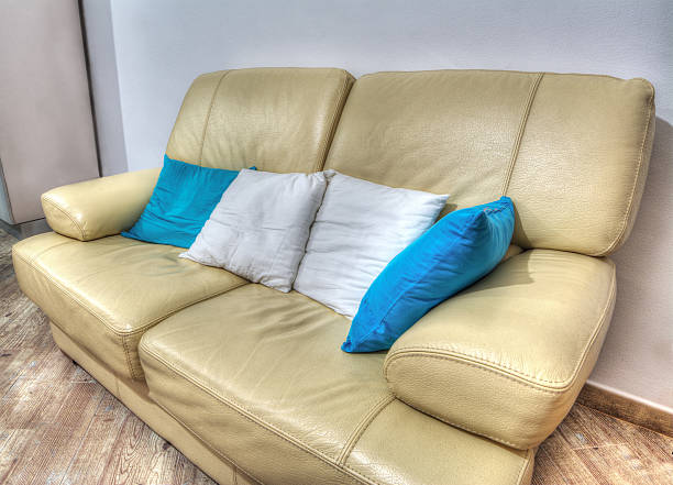 istock leather couch with pillows in a living room in hdr 534780759