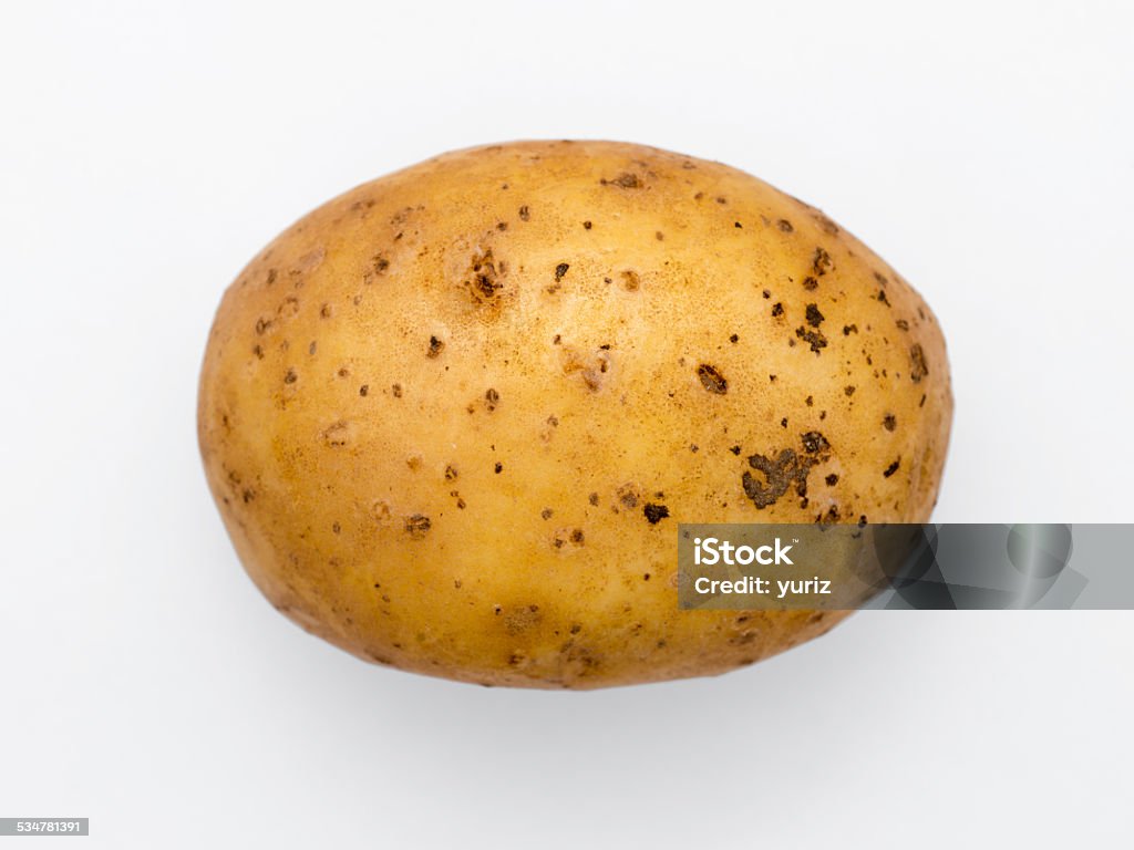 potato isolated raw potato tuber isolated on white background Raw Potato Stock Photo