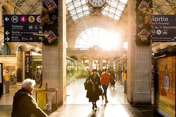 Passangers walking on the Gare du Nord Station in Paris. Paris, France - December 31, 2014: Passangers walking on the famous Gare du Nord Station in Paris, France. Eurostar stock pictures, royalty-free photos & images