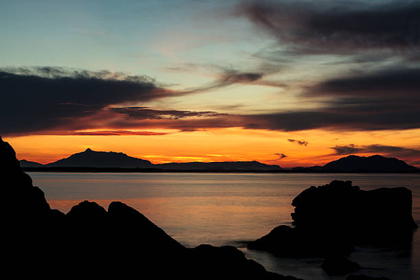 istock Rock silhouettes and vivid sunset 534782645