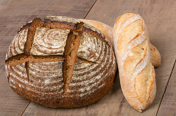 istock Loaf of fresh rye bread on a table 534782937