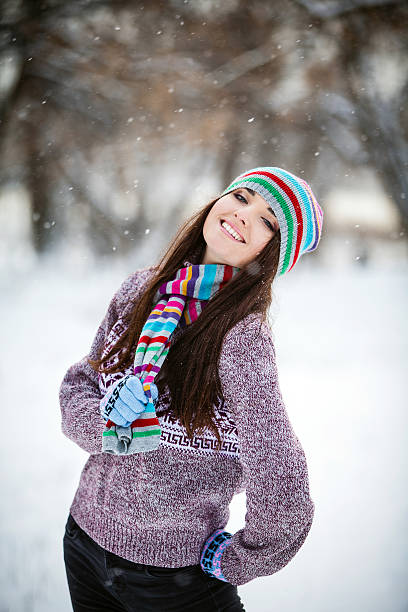 Girl in winter forest stock photo