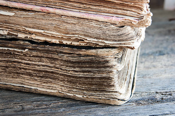 istock old books on a wooden background 534784621