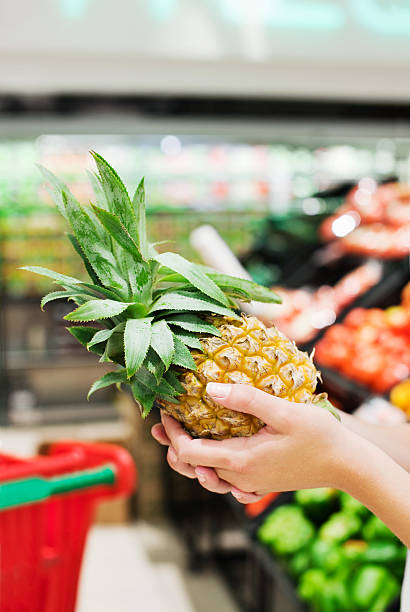 istock Woman Holding Pineapple 534786189