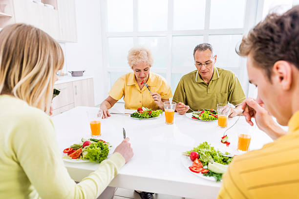 istock Family eating salad. 534786371